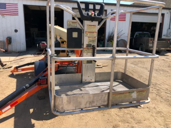 14 JLG T350 Tow Behind Boom Lift basket