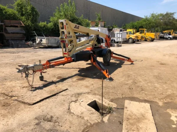 14 JLG T350 Tow Behind Boom Lift