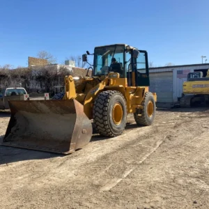 Front angled view of 2005 Kawasaki 65Z-V wheel loader.