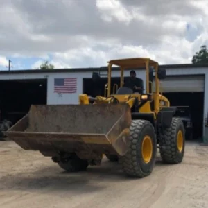 Front view of a 2005 Komatsu WA250 5L wheel loader