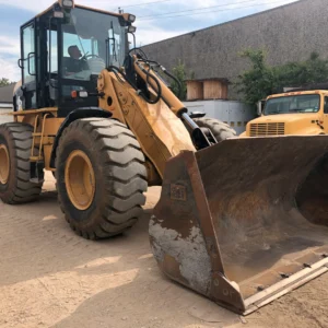 Catepillar 924G Wheel Loader Tool-Carrier With a bucket. Taken at an angled view of the full tractor.
