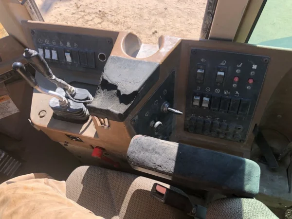Control panel of a 1996 Cat 950F II wheel loader.