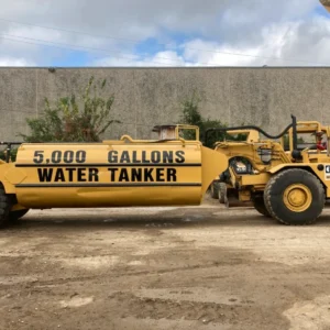 Caterpillar water wagon with 5000 gallon capacity.