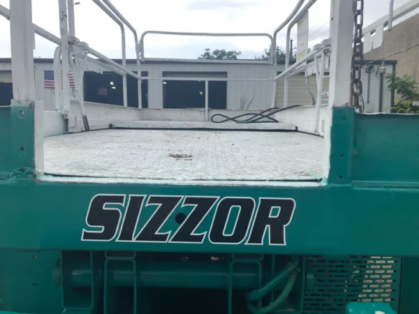 TractorTip JLG 33RTS Rough Terrain Scissor Lift basket