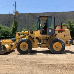 TractorTip New Holland LW110 Loader Side View